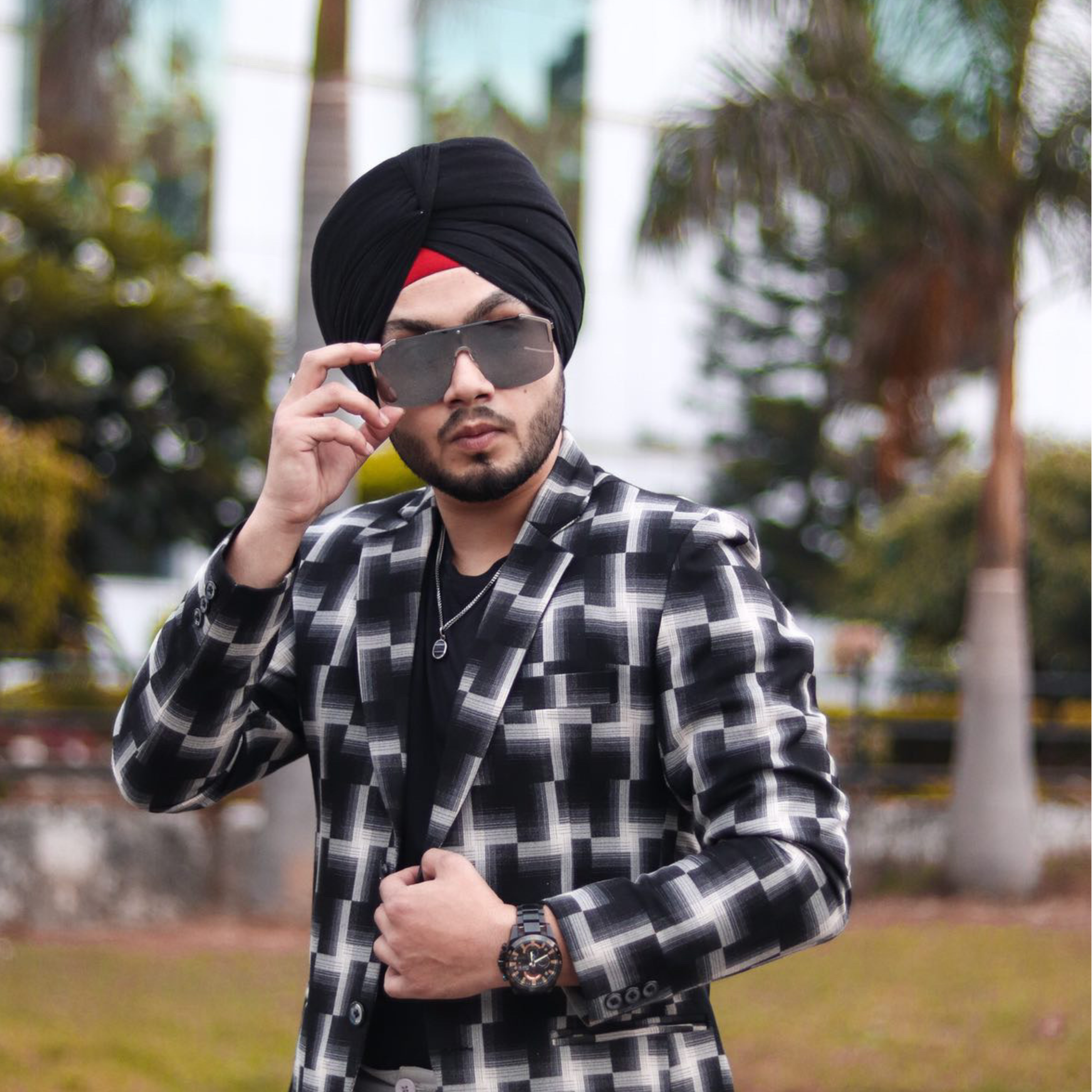 Image of Indian Man wearing a pink turban with Sunglasses-JY913851-Picxy